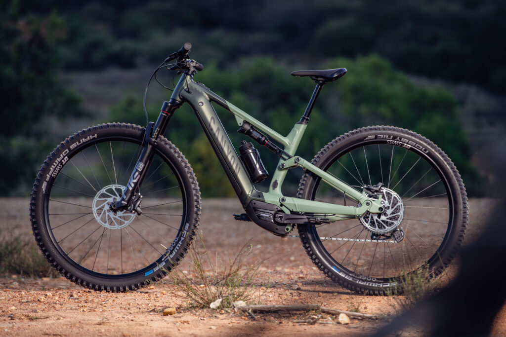 Canyon bicycles Neron On E-mountain bike, green and dark green coloring. Product photo by Rob Wessels San DIego photographer.