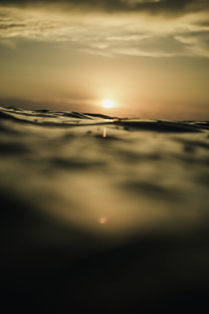 fine art photography, sun setting in to the ocean in Carlsbad California