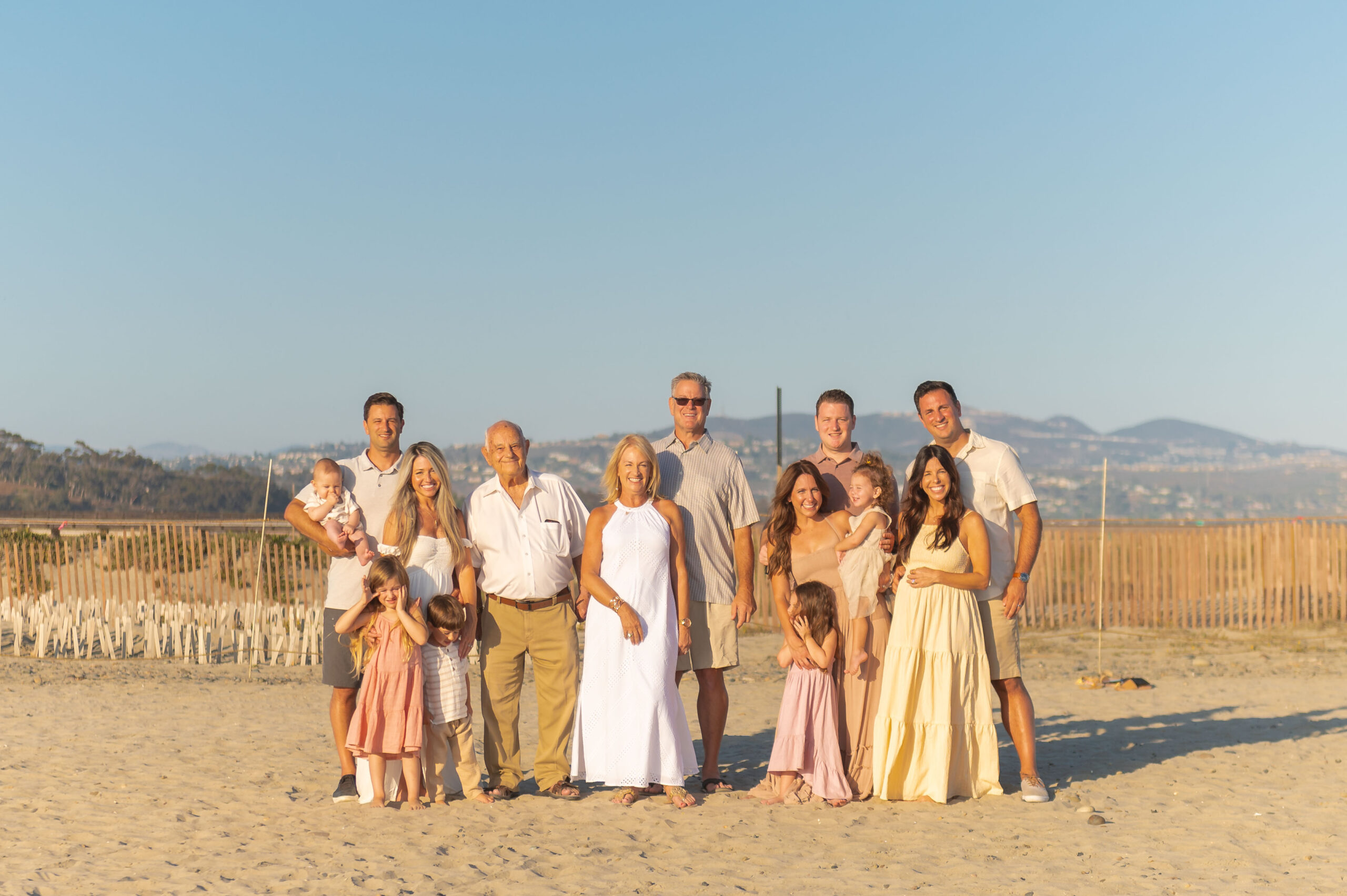 Family photos at south carlsbad state beach on a clear summer afternoon