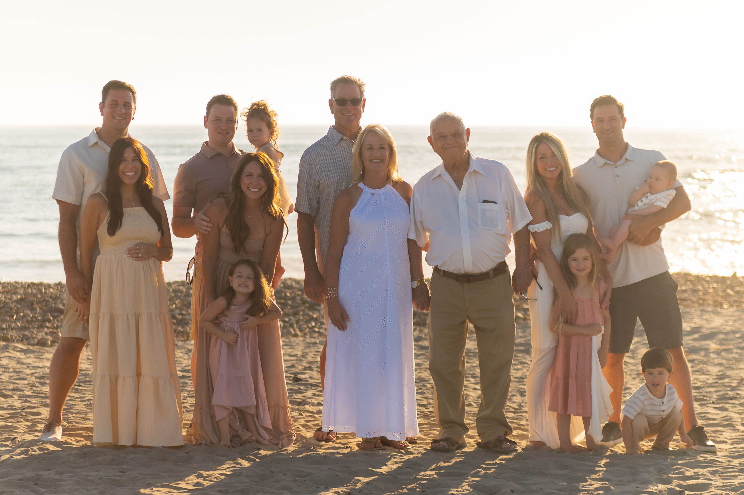 backlit photo with the ocean in the background, Family photos at south carlsbad state beach on a clear summer afternoon