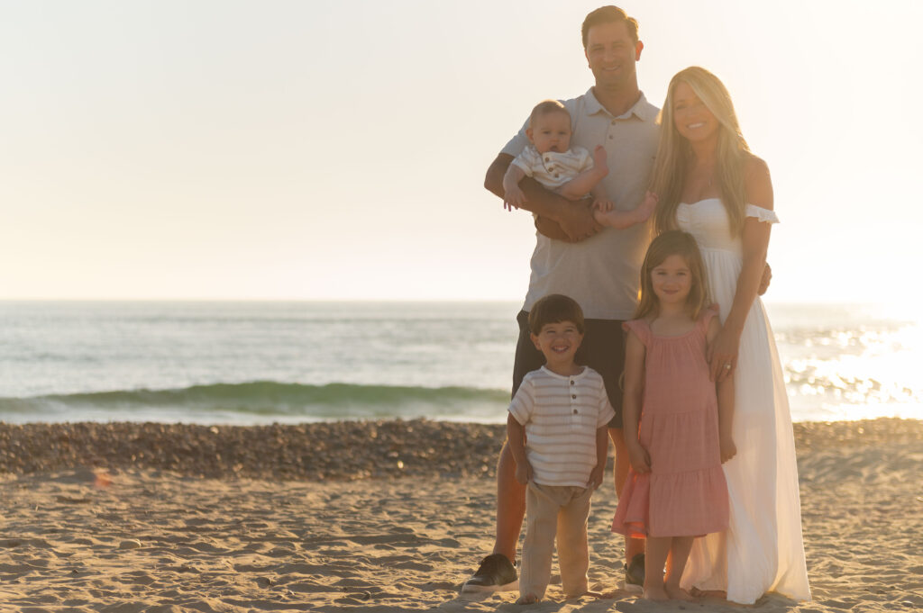 backlit family portrait on the beach in south carlsbad