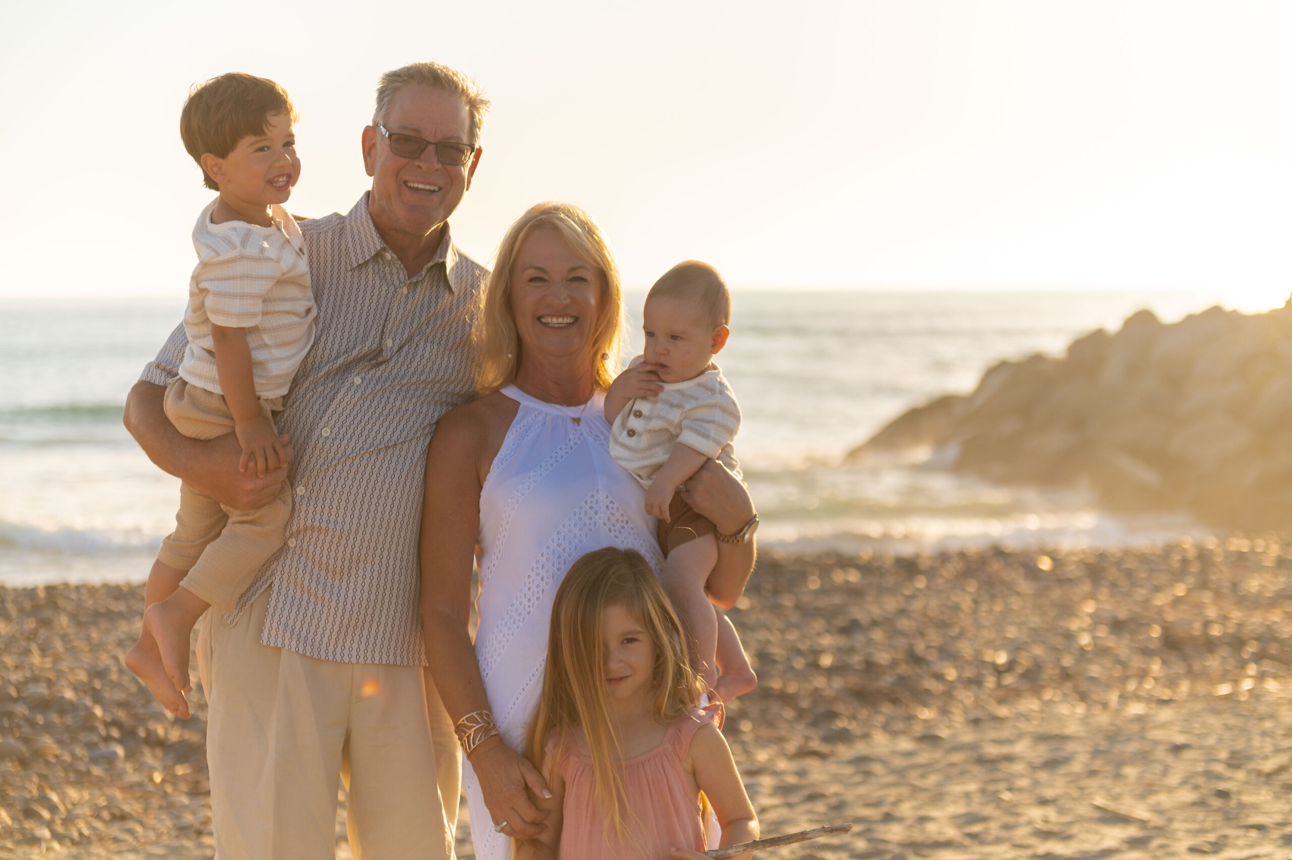Family photos at south carlsbad state beach on a clear summer afternoon