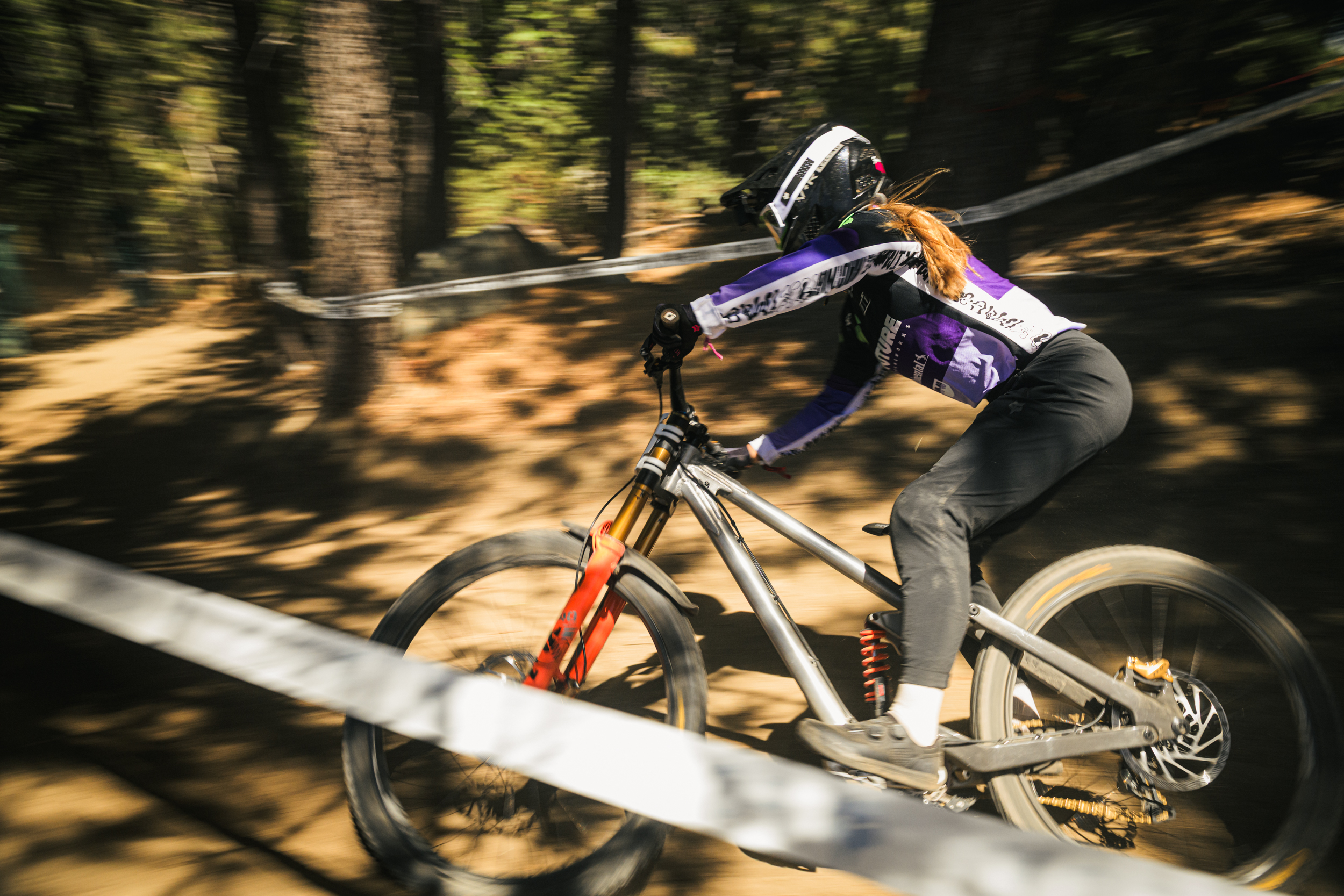 frameworks racing junior pro team, female pro down hill racer at the pro downhill race at big bear lake