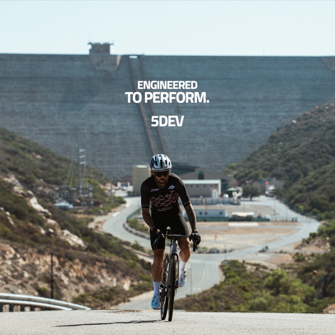 5dev meta ad featuring the road cyclist with the large dam behind him.